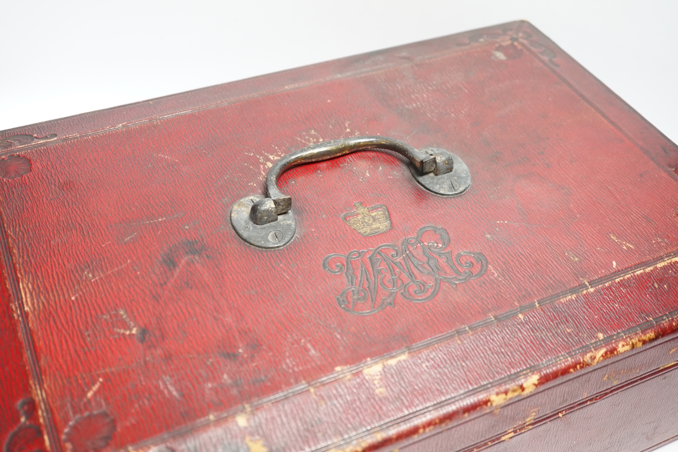 A Victorian red Morocco dispatch box (locked with no key)